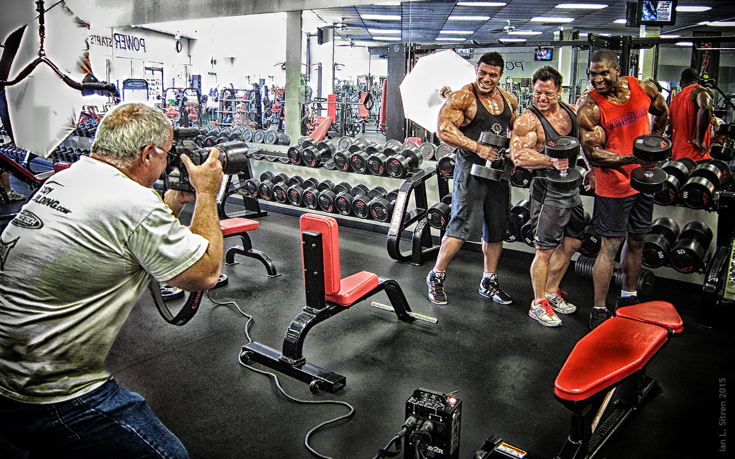 Bodybuilders Xavisus Gayden, Grant Pieterse and Jake Sawyer working out during our photo shoot in the gym