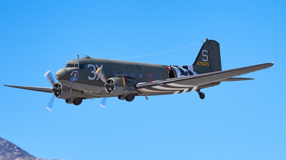 Santa Arriving In His C-47 "What's Up Doc?"